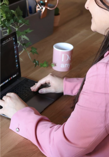 Realtor mom following up with clients and building referral systems from her laptop